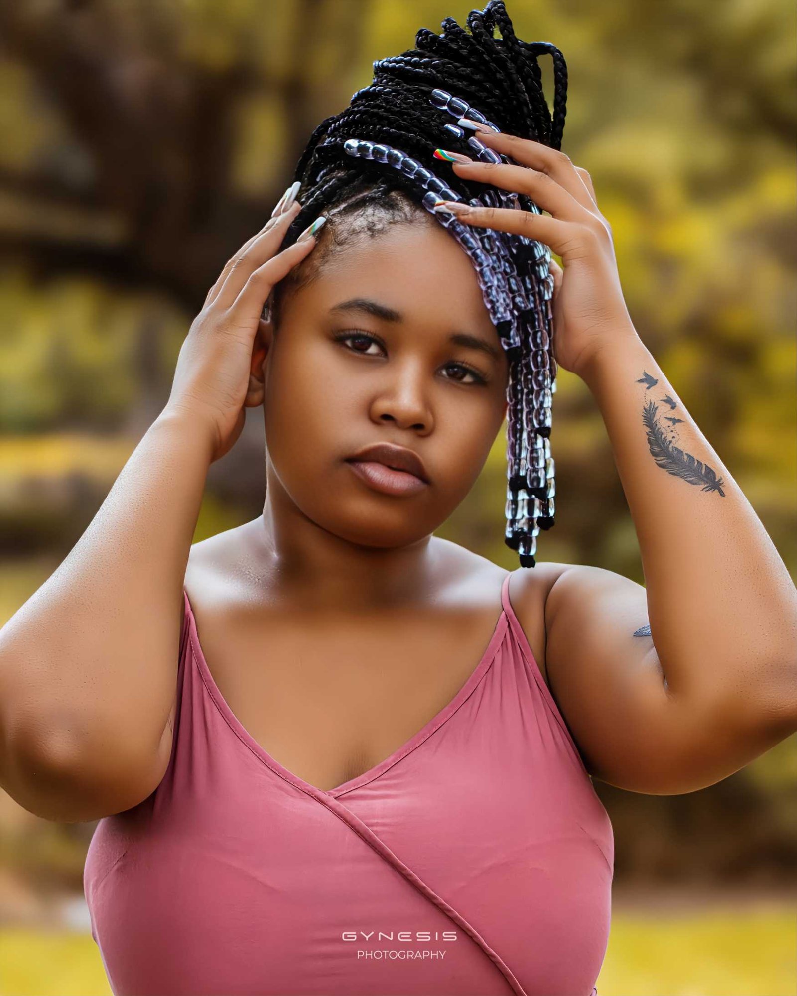 Lifestyle portrait photoshoot in Pretoria, Pretoria North, Pretoria West, Gauteng, South Africa featuring a model with braided hair posing confidently outdoors.
