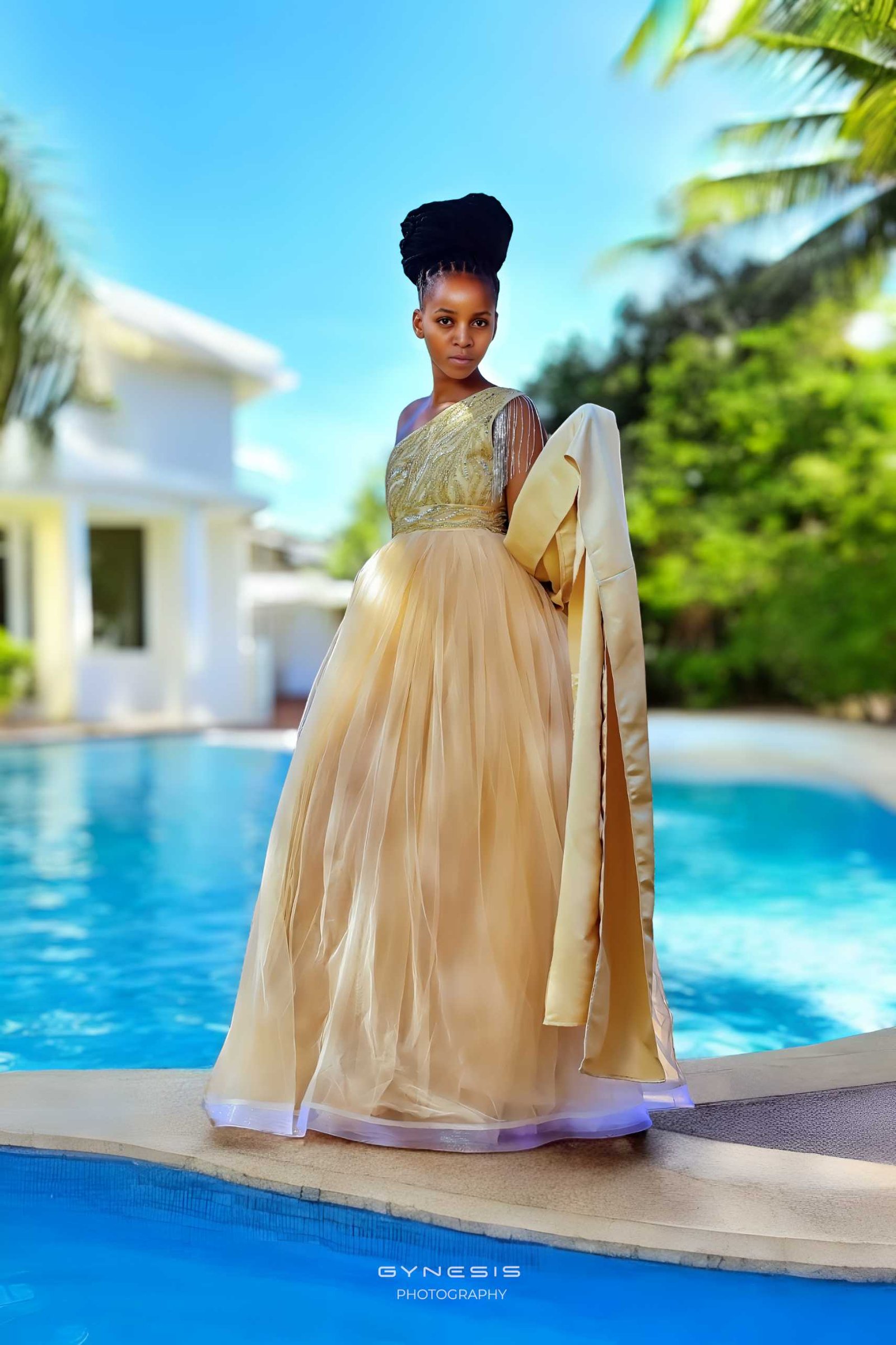 Matric dance photoshoot in Pretoria, Pretoria North, Pretoria West, Gauteng, South Africa featuring a model in an elegant golden gown next to a swimming pool